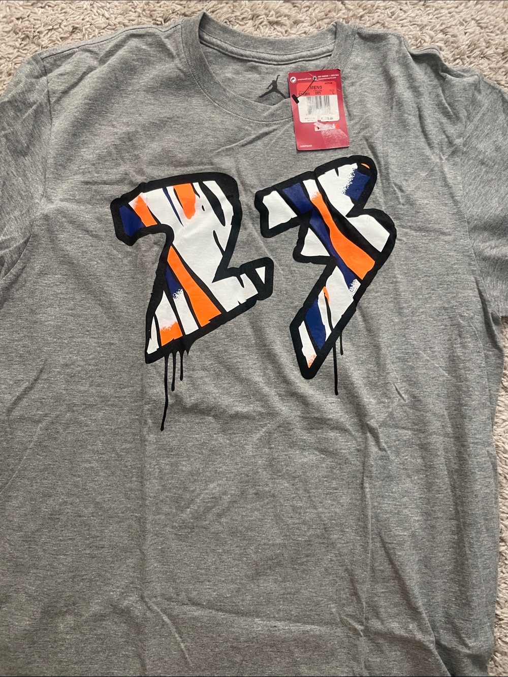 Jordan Gray Short Sleeve Tee with White, Orange & Blue '23' Graphic